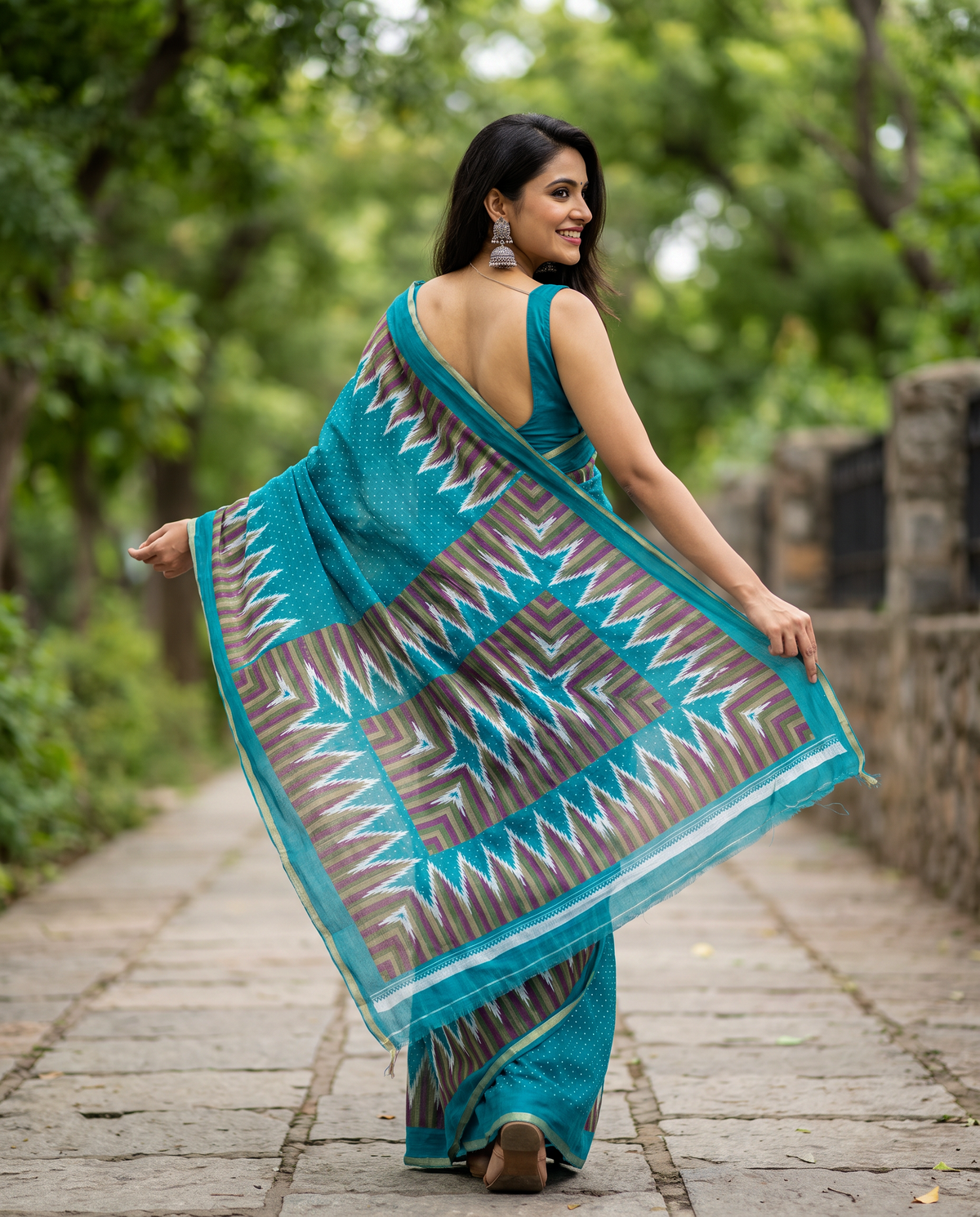 Women's Cotton Blend Ikat Print Saree with Unstitched Blouse Piece.