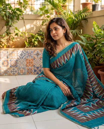 Women's Cotton Blend Ikat Print Saree with Unstitched Blouse Piece.