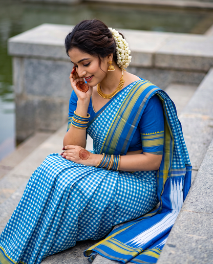 Women's Synthetic Silk Blend Checked Saree with Contrast Border & Unstitched Blouse Piece.