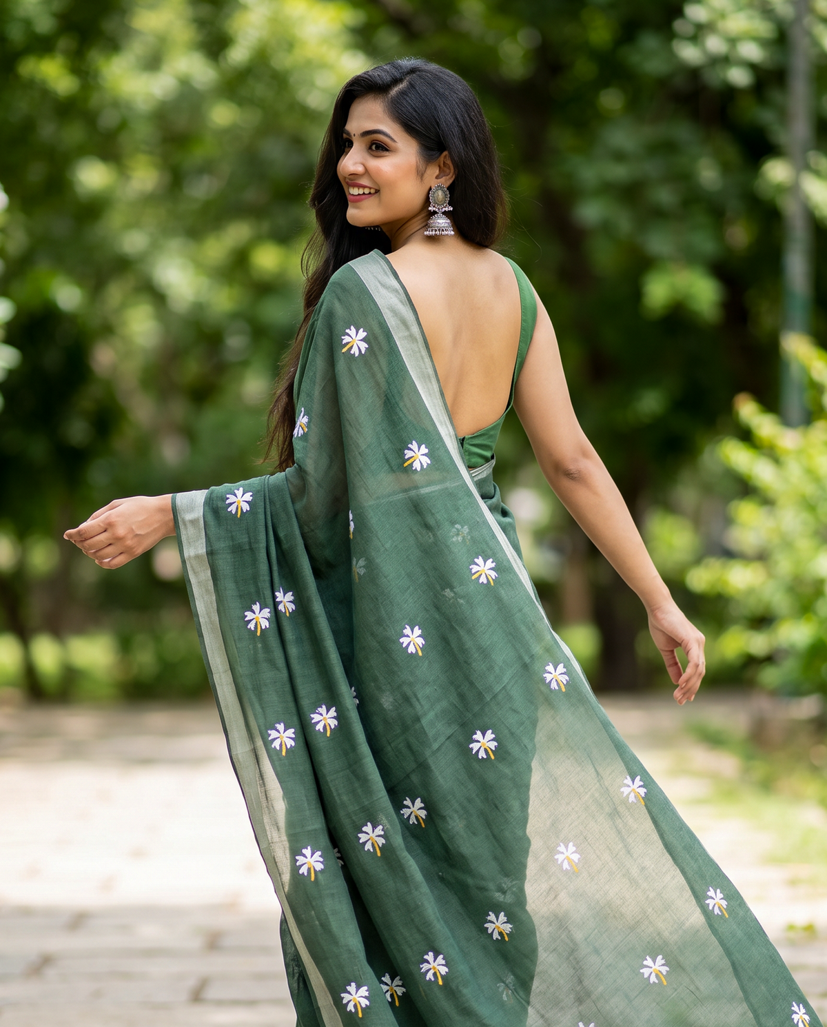 Women's Pure Linen Cotton Floral Embroidered Saree with Unstitched Blouse Piece.