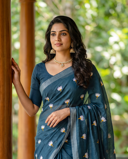 Women's Pure Linen Cotton Floral Embroidered Saree with Unstitched Blouse Piece.