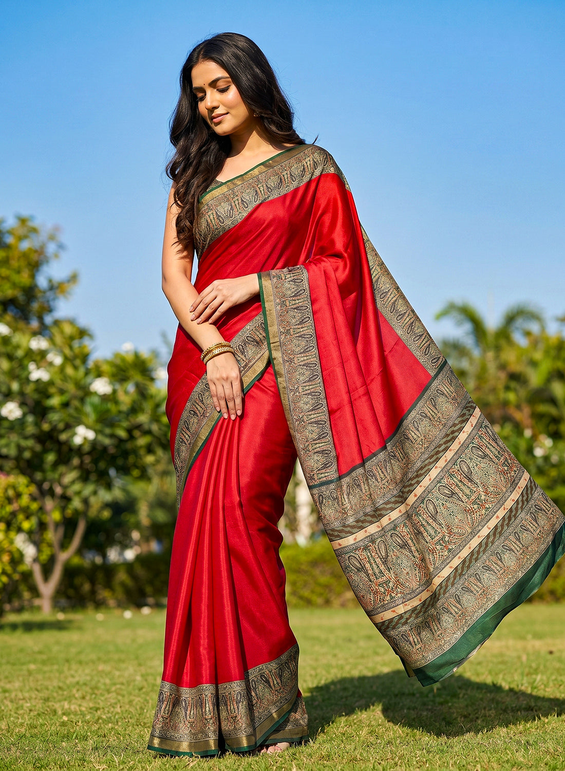 Women's Printed Silk Blend Saree with Unstitched Blouse Piece.