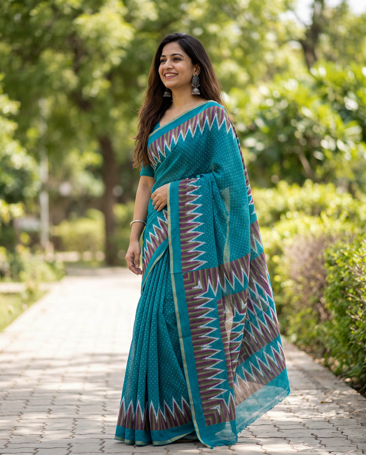 Women's Cotton Blend Ikat Print Saree with Unstitched Blouse Piece.