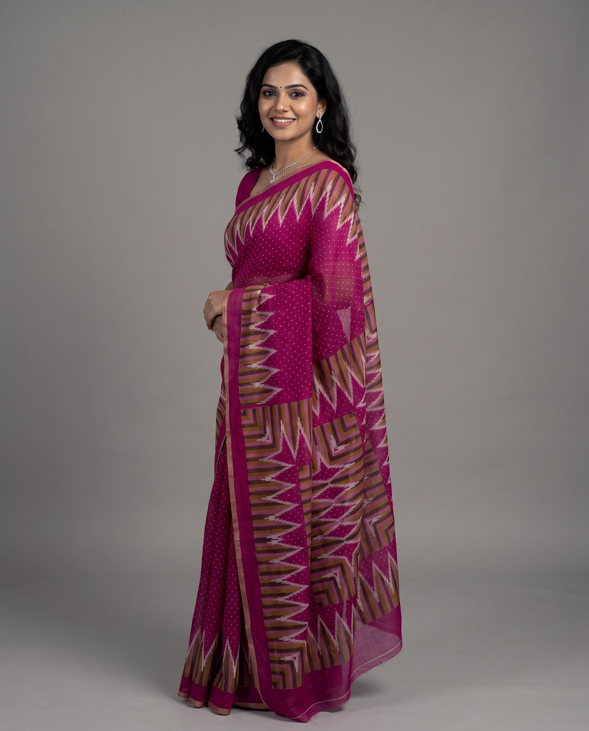 Women's Cotton Blend Ikat Print Saree with Unstitched Blouse Piece.