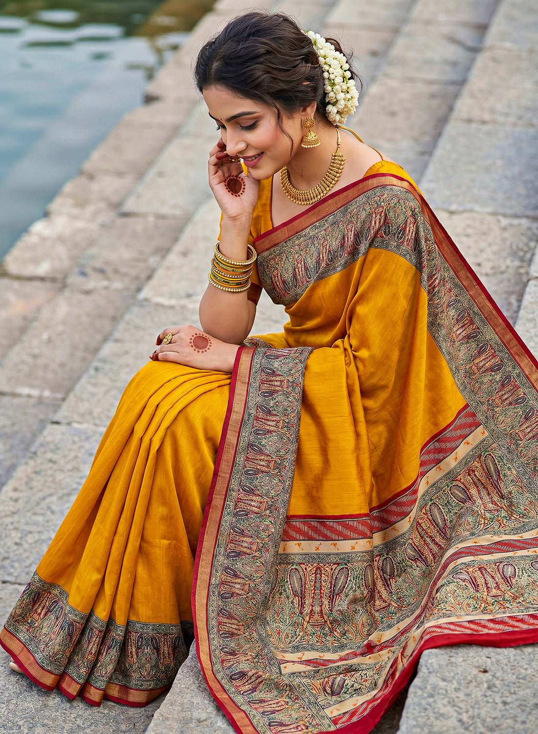 Women's Printed Silk Blend Saree with Unstitched Blouse Piece.