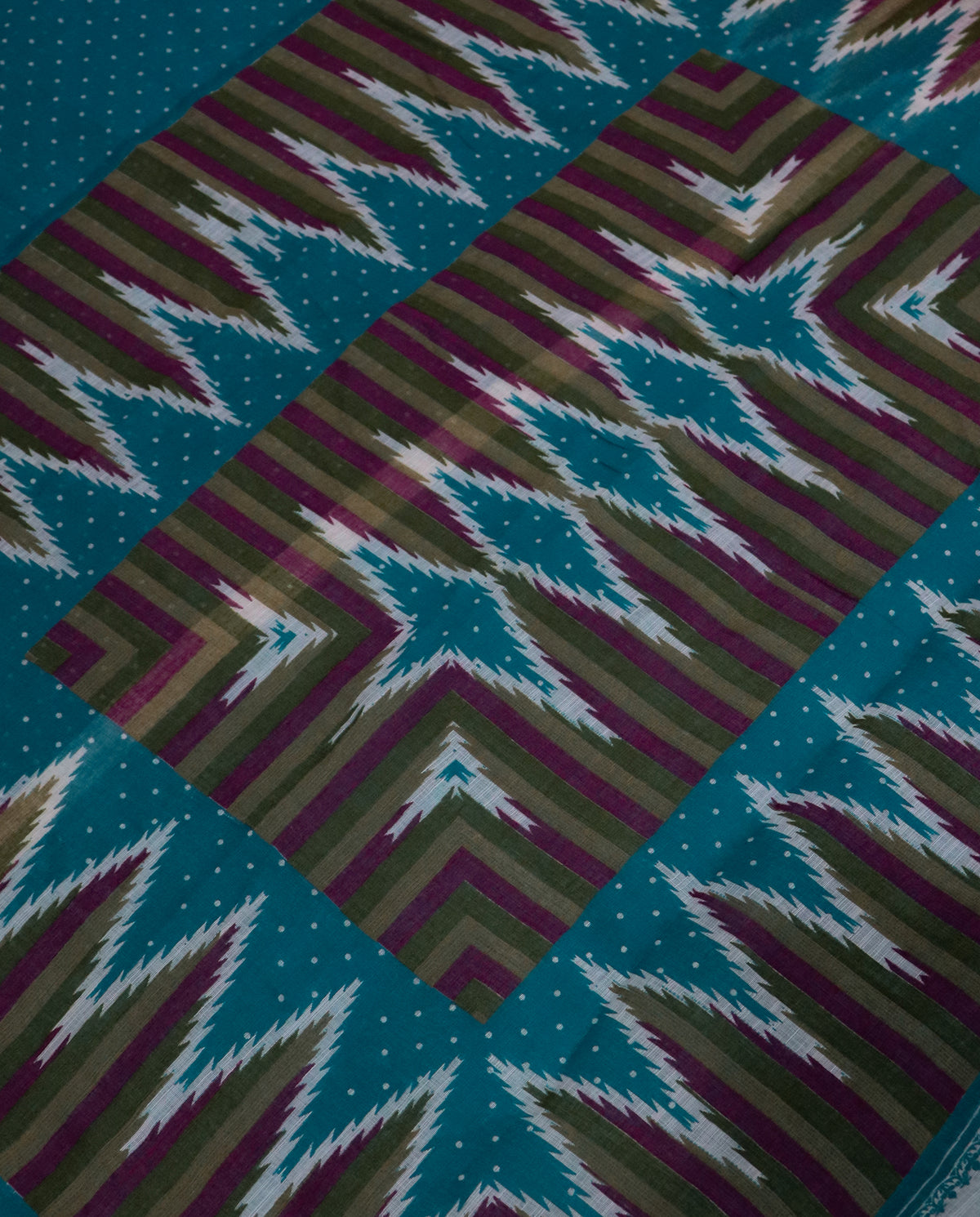 Women's Cotton Blend Ikat Print Saree with Unstitched Blouse Piece.