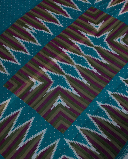 Women's Cotton Blend Ikat Print Saree with Unstitched Blouse Piece.