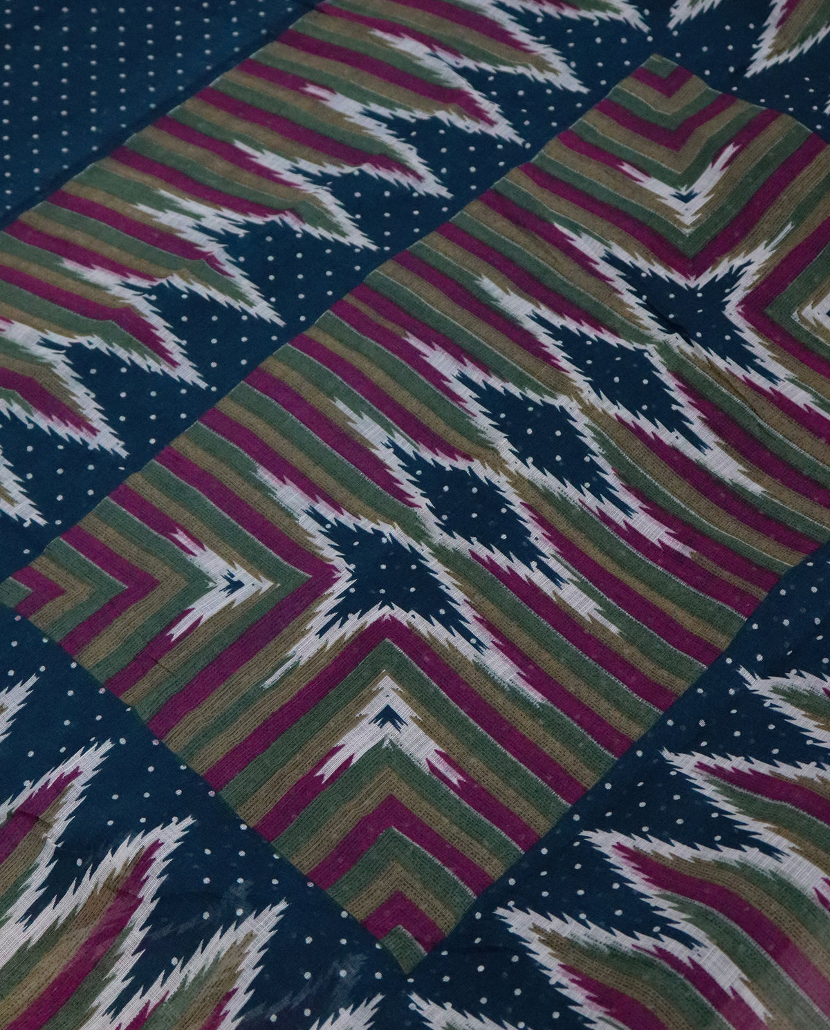 Women's Cotton Blend Ikat Print Saree with Unstitched Blouse Piece.