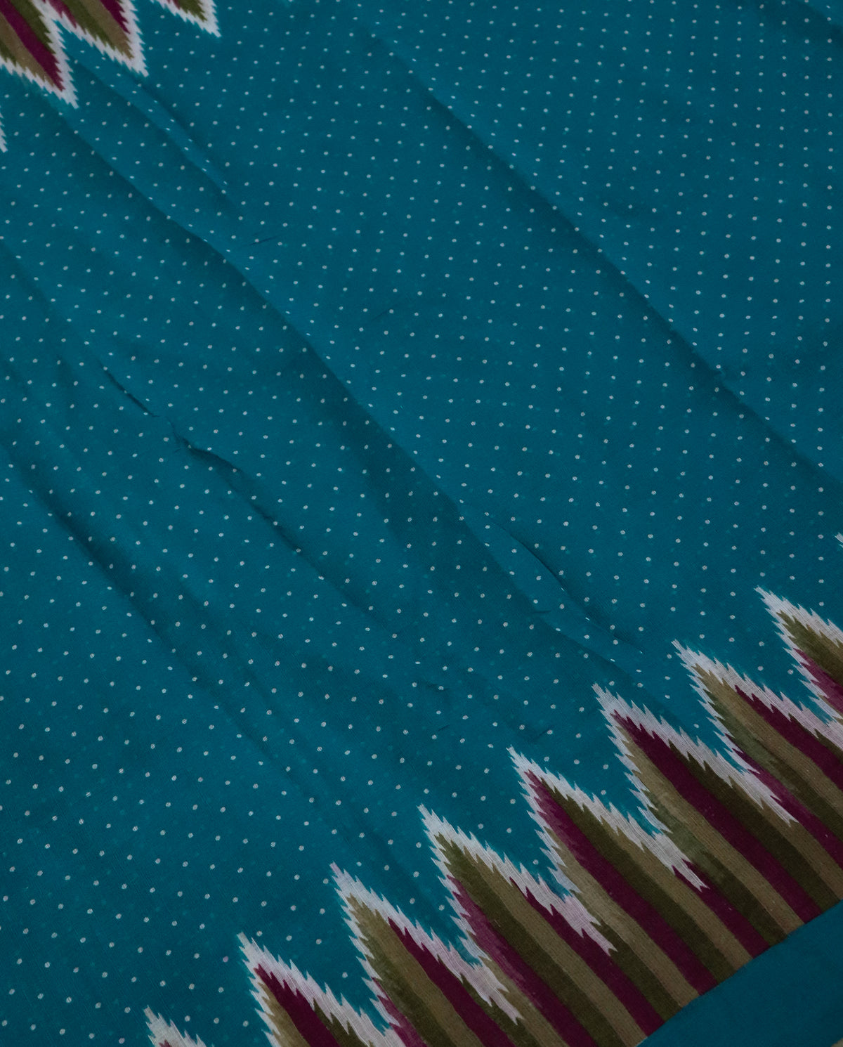 Women's Cotton Blend Ikat Print Saree with Unstitched Blouse Piece.